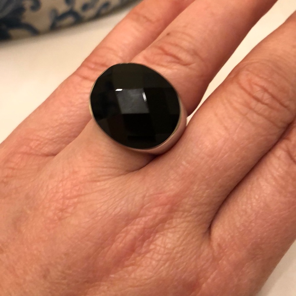 Silver and onyx cocktail ring .